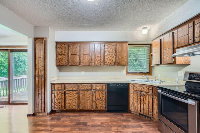 2833 Flag Ave N, New Hope, MN 55427 - kitchen with dishwasher, stainless steel electric stove, a textured ceiling, under cabinet range hood, and brown cabinets