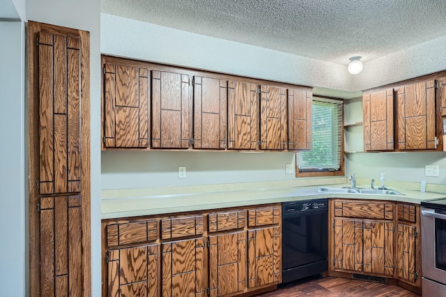2833 Flag Ave N, New Hope, MN 55427 - kitchen featuring black dishwasher, a textured ceiling, stainless steel range with electric cooktop, brown cabinets, and dark wood finished floors