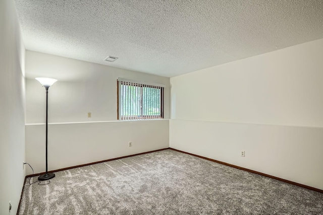 2833 Flag Ave N, New Hope, MN 55427 - carpeted spare room featuring baseboards and a textured ceiling