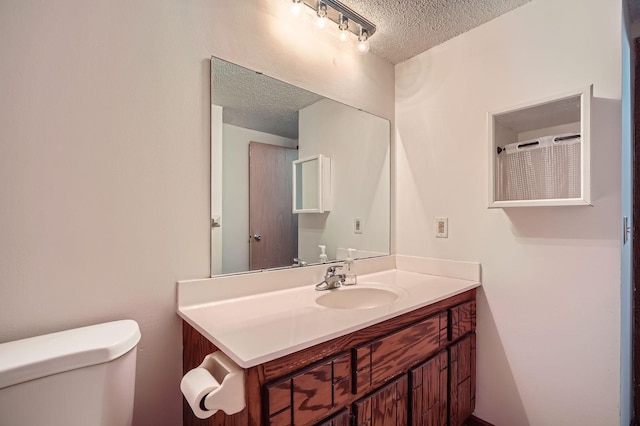 2833 Flag Ave N, New Hope, MN 55427 - bathroom featuring a textured ceiling and vanity