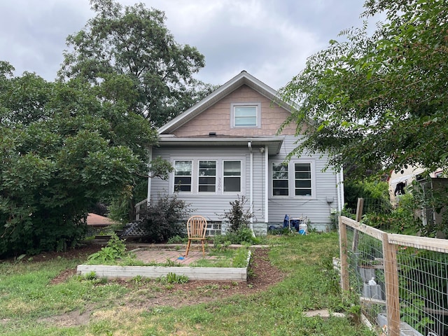 3306 Humboldt Ave N, Minneapolis, MN 55412 - rear view of house with a garden