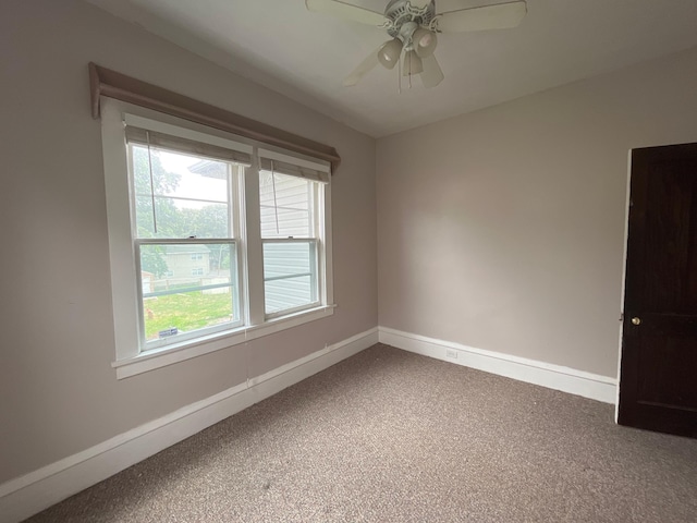3306 Humboldt Ave N, Minneapolis, MN 55412 - carpeted empty room featuring baseboards and ceiling fan