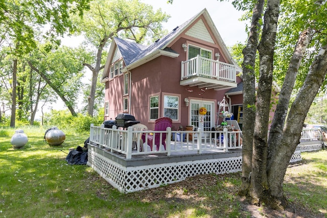 37245 US Highway 59 SE, Knute Twp, MN 56556 - back of property with a balcony, a yard, french doors, a deck, and a shingled roof