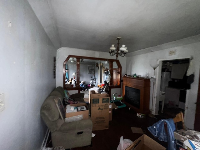 201 Harrison Ave, Sacred Heart, MN 56285 - living room featuring a chandelier and a fireplace