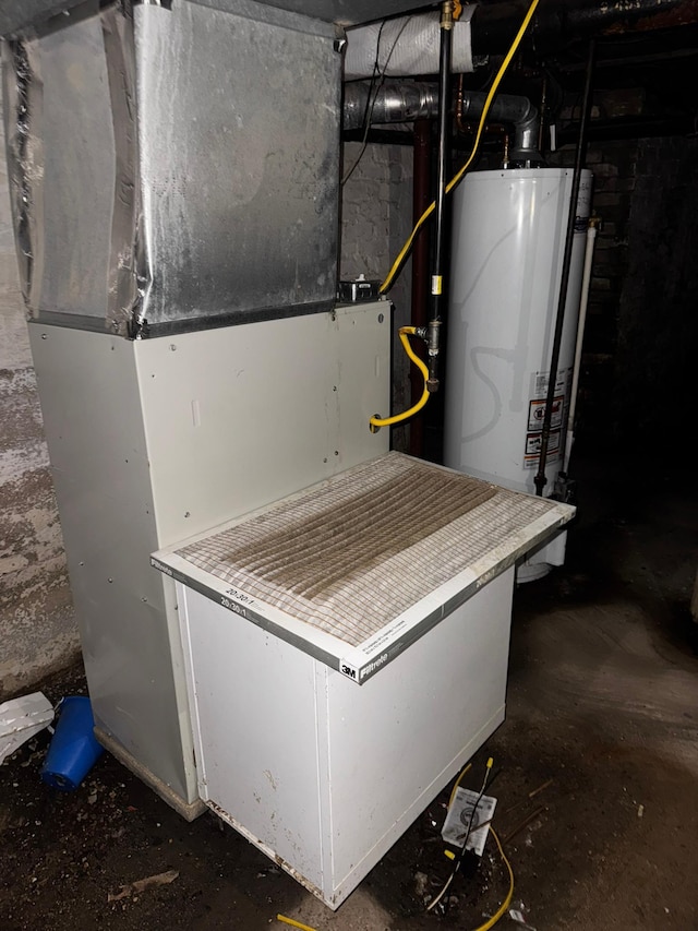 201 Harrison Ave, Sacred Heart, MN 56285 - utility room with gas water heater