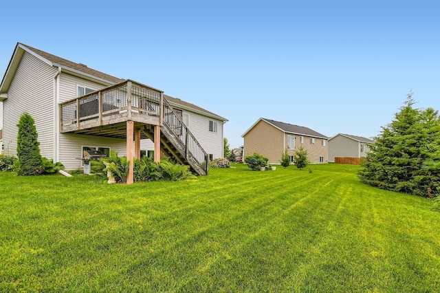 25520 10th St W, Zimmerman, MN 55398 - rear view of house with a wooden deck, a yard, and stairs