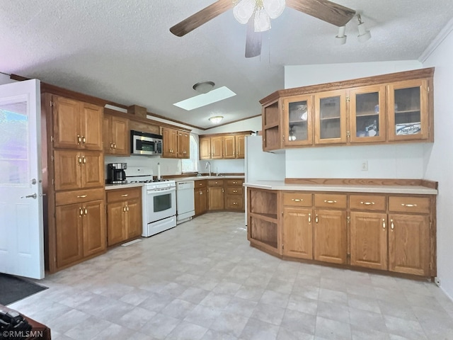 13496 Campfire Cir, South Haven, MN 55382 - kitchen with white appliances, brown cabinetry, a textured ceiling, open shelves, and vaulted ceiling