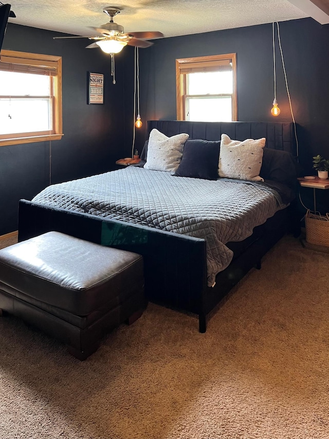 907 22nd Ave S, Moorhead, MN 56560 - carpeted bedroom featuring a textured ceiling and ceiling fan