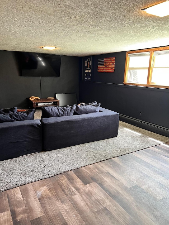 907 22nd Ave S, Moorhead, MN 56560 - living area featuring a textured ceiling and wood finished floors