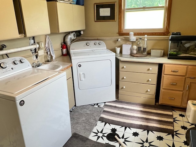 907 22nd Ave S, Moorhead, MN 56560 - laundry room featuring washer and dryer and cabinet space
