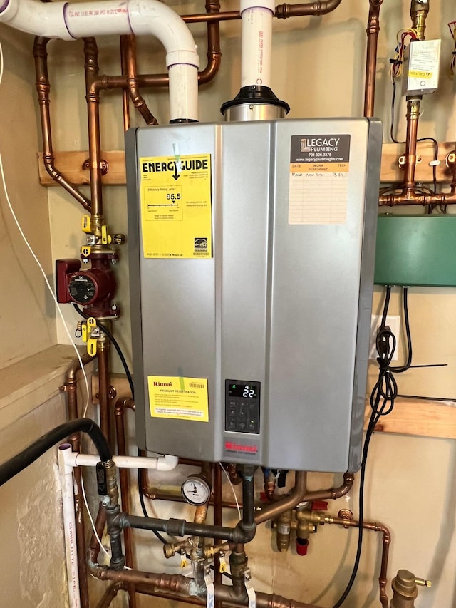 907 22nd Ave S, Moorhead, MN 56560 - utility room with water heater