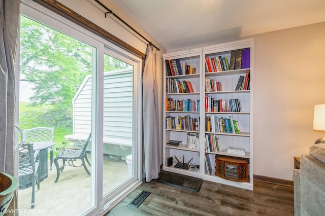 1007 124th Cir NW, Coon Rapids, MN 55448 - living area with wood finished floors and baseboards