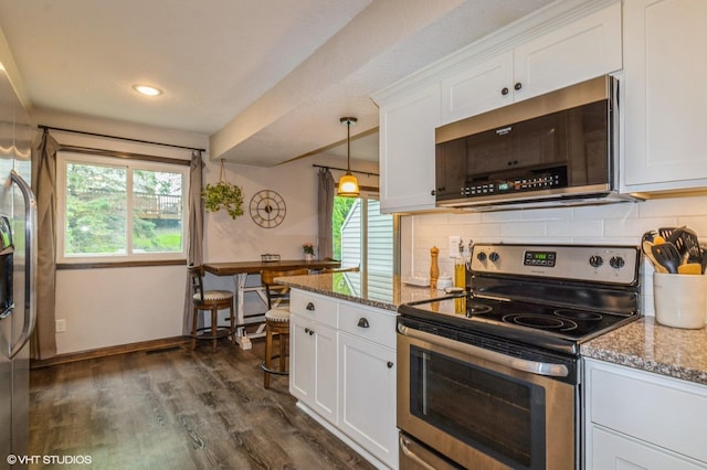 1007 124th Cir NW, Coon Rapids, MN 55448 - kitchen featuring appliances with stainless steel finishes, white cabinets, backsplash, and recessed lighting