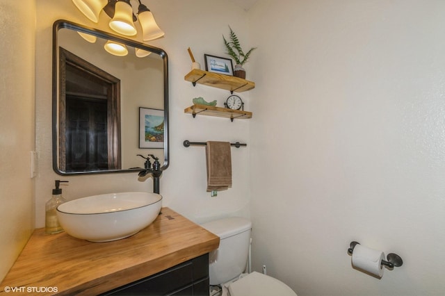 1007 124th Cir NW, Coon Rapids, MN 55448 - bathroom featuring toilet and vanity