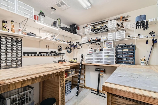 1755 Ranier Ln N, Plymouth, MN 55447 - miscellaneous room featuring a workshop area and concrete floors