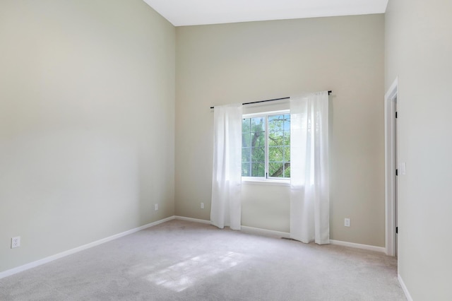 2145 Shenandoah Ct Unit D, Plymouth, MN 55447 - unfurnished room with light colored carpet and a towering ceiling