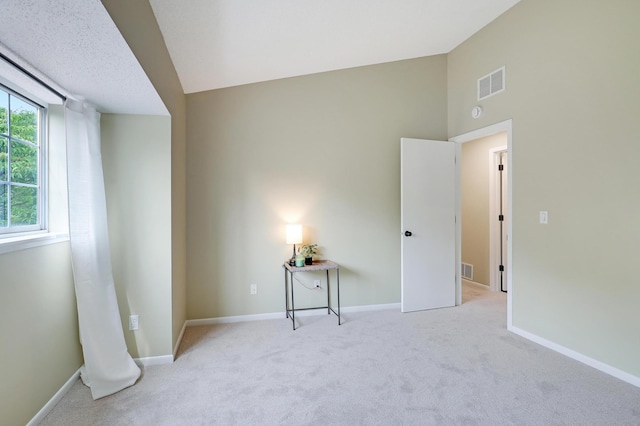 2145 Shenandoah Ct Unit D, Plymouth, MN 55447 - unfurnished bedroom with carpet flooring and lofted ceiling