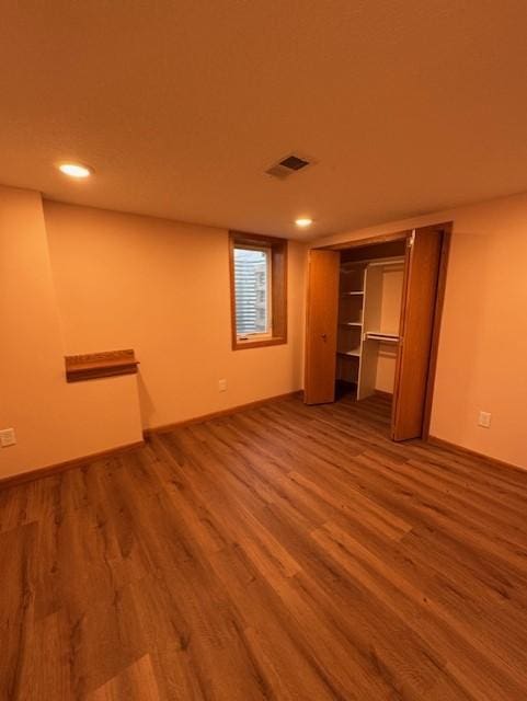 137 20th Ave S, Saint Cloud, MN 56301 - unfurnished bedroom with wood finished floors and recessed lighting