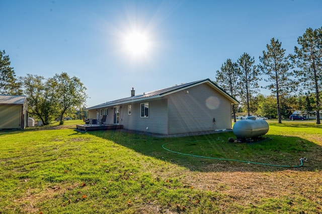 329 Kelliher Rd SW, Kelliher, MN 56650 - back of property featuring a yard