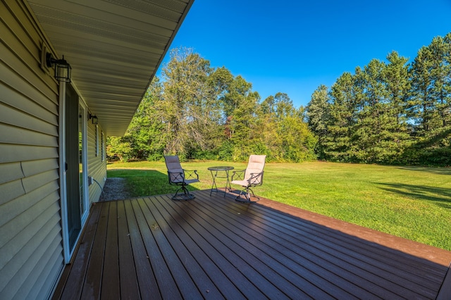 329 Kelliher Rd SW, Kelliher, MN 56650 - wooden terrace with a yard