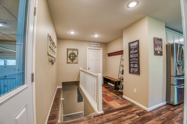 329 Kelliher Rd SW, Kelliher, MN 56650 - hallway with dark wood-style floors and recessed lighting