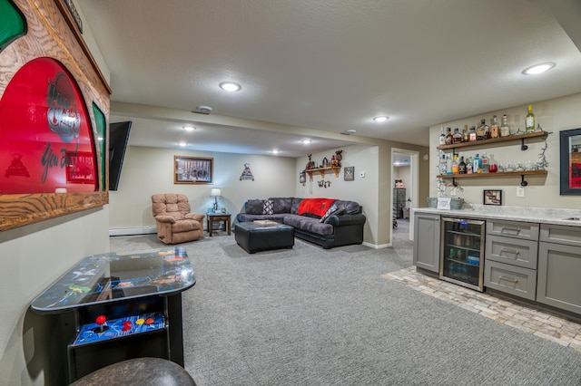 329 Kelliher Rd SW, Kelliher, MN 56650 - living area featuring wine cooler, bar with sink, recessed lighting, a baseboard radiator, and carpet floors