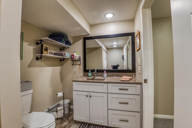 329 Kelliher Rd SW, Kelliher, MN 56650 - half bath featuring toilet and vanity