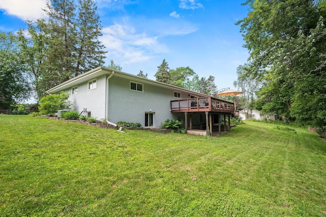 8544 Demontreville Trl N, Lake Elmo, MN 55042 - back of property featuring stucco siding, a wooden deck, and a yard