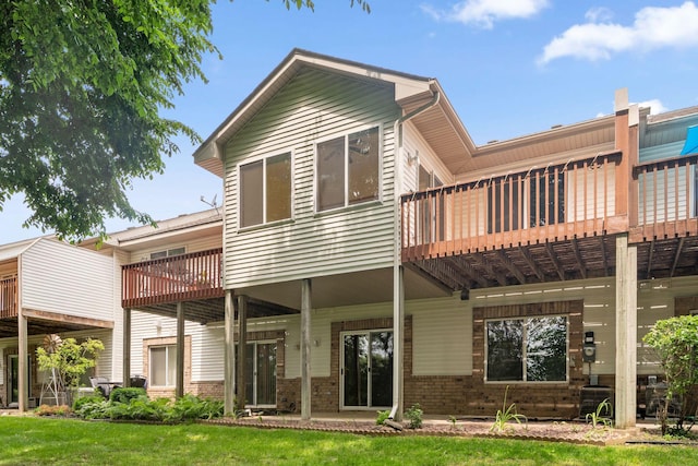 14208 Heritage Ln, Apple Valley, MN 55124 - back of property featuring brick siding and a lawn