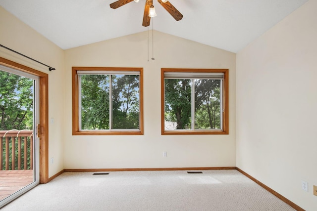 14208 Heritage Ln, Apple Valley, MN 55124 - empty room featuring healthy amount of natural light, carpet, a ceiling fan, and lofted ceiling