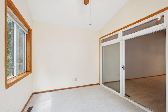 14208 Heritage Ln, Apple Valley, MN 55124 - unfurnished bedroom featuring multiple windows, lofted ceiling, ceiling fan, and carpet flooring