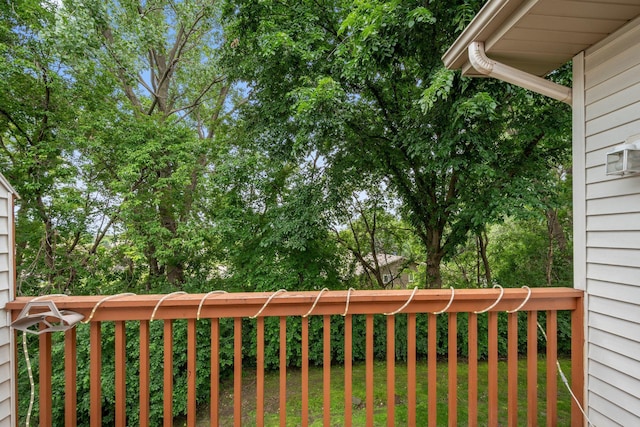 14208 Heritage Ln, Apple Valley, MN 55124 - wooden terrace featuring a lawn and view of wooded area