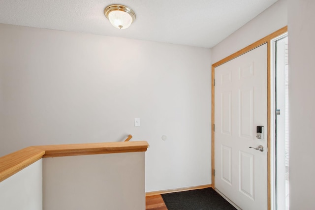 14208 Heritage Ln, Apple Valley, MN 55124 - foyer with wood finished floors and baseboards