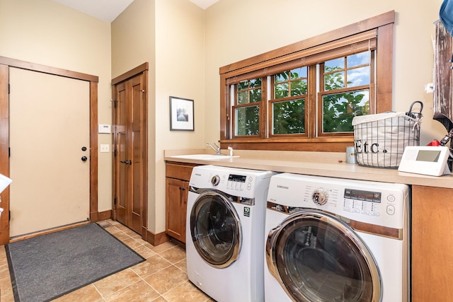 19270 Foxfield Dr, Credit River Twp, MN 55372 - laundry area with washer and clothes dryer, cabinet space, and light tile patterned flooring