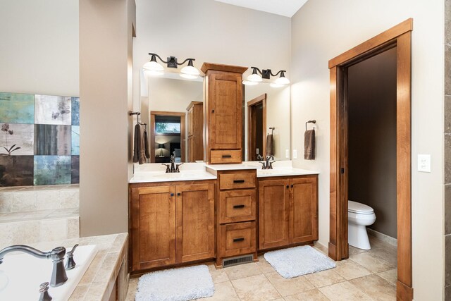 19270 Foxfield Dr, Credit River Twp, MN 55372 - bathroom featuring double vanity, a garden tub, and tile patterned flooring