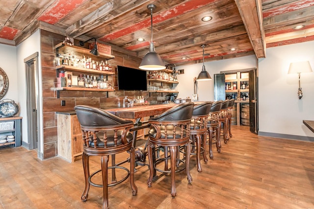 19270 Foxfield Dr, Credit River Twp, MN 55372 - indoor wet bar featuring light wood-style flooring, pendant lighting, and recessed lighting