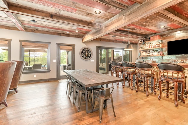 19270 Foxfield Dr, Credit River Twp, MN 55372 - dining space featuring a bar, light wood-style floors, healthy amount of natural light, a wood ceiling with exposed beams, and recessed lighting