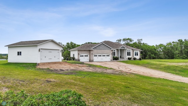 15544 260th St S, Tansem Twp, MN 56514 - view of front facade featuring a front lawn, an outdoor structure, and a garage