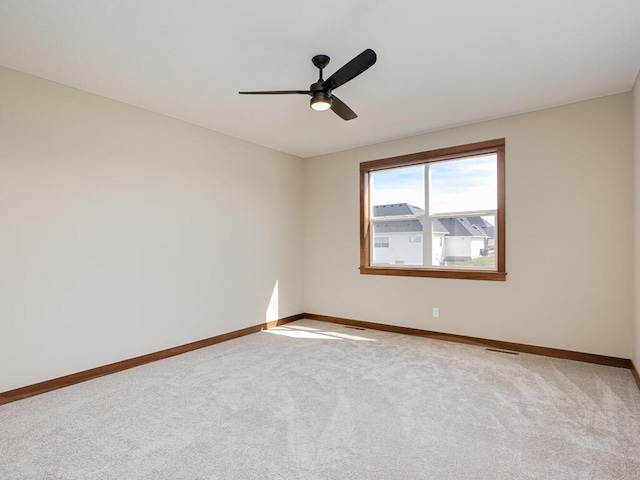 1136 168th Ln NW, Andover, MN 55304 - spare room featuring ceiling fan and carpet flooring