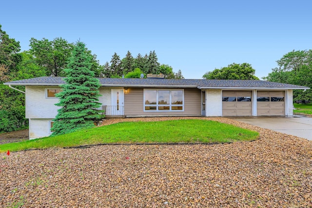 12258 Crooked Lake Blvd NW, Coon Rapids, MN 55433 - ranch-style house with driveway, a garage, brick siding, and a front yard
