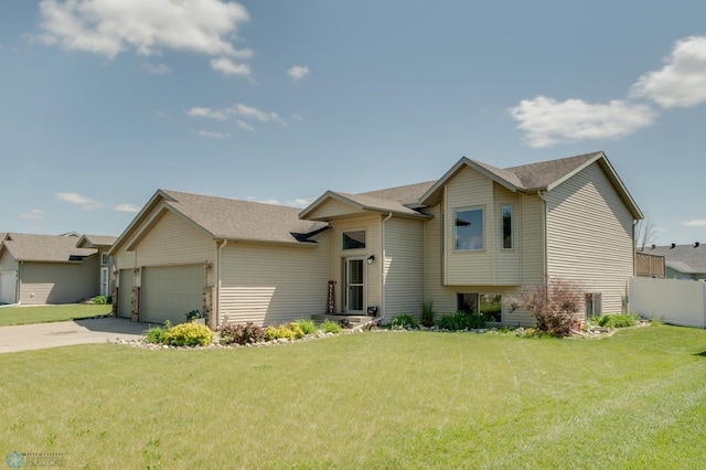 1083 Parkway Ln, West Fargo, ND 58078 - view of front facade featuring an attached garage, driveway, and a shingled roof