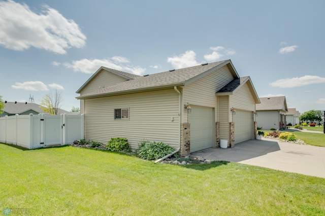 1083 Parkway Ln, West Fargo, ND 58078 - view of property exterior featuring concrete driveway, an attached garage, roof with shingles, and a gate