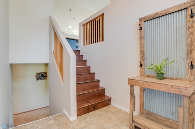 1083 Parkway Ln, West Fargo, ND 58078 - stairs with tile patterned floors and recessed lighting