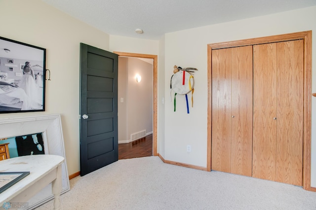 1083 Parkway Ln, West Fargo, ND 58078 - carpeted bedroom with a closet and baseboards