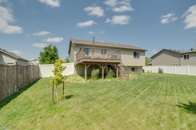 1083 Parkway Ln, West Fargo, ND 58078 - back of house featuring stairs, a wooden deck, and a fenced backyard