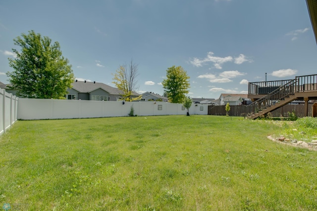 1083 Parkway Ln, West Fargo, ND 58078 - fenced backyard with stairway and a residential view