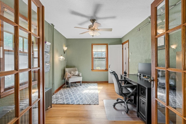 123 Franklin Ave, Owatonna, MN 55060 - office space with light wood finished floors, a ceiling fan, and a textured ceiling