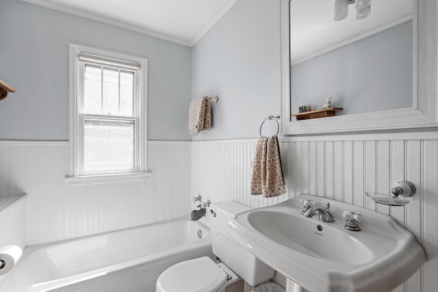 123 Franklin Ave, Owatonna, MN 55060 - full bathroom with a bath, a wainscoted wall, and crown molding