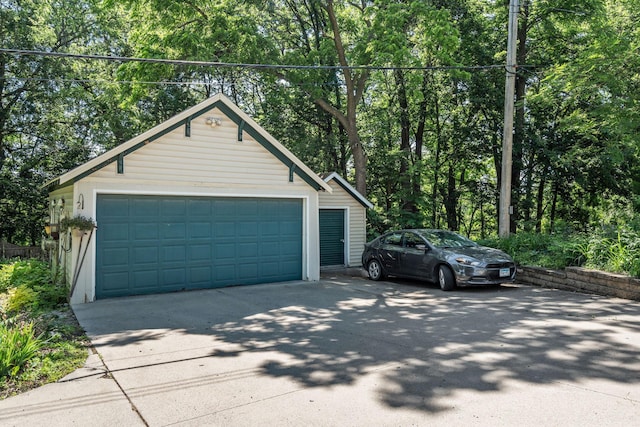 123 Franklin Ave, Owatonna, MN 55060 - detached garage with view of scattered trees