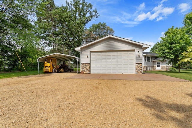 23481 Fontana St NE, Linwood Twp, MN 55079 - garage featuring dirt driveway and a carport